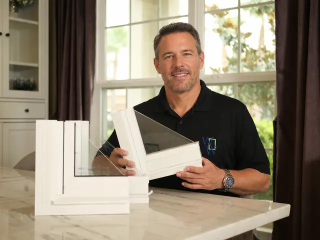 WindowWall expert showcasing premium insulated heavy duty frame replacement window samples